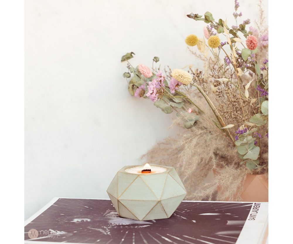 Dried flower arrangement in concrete vases