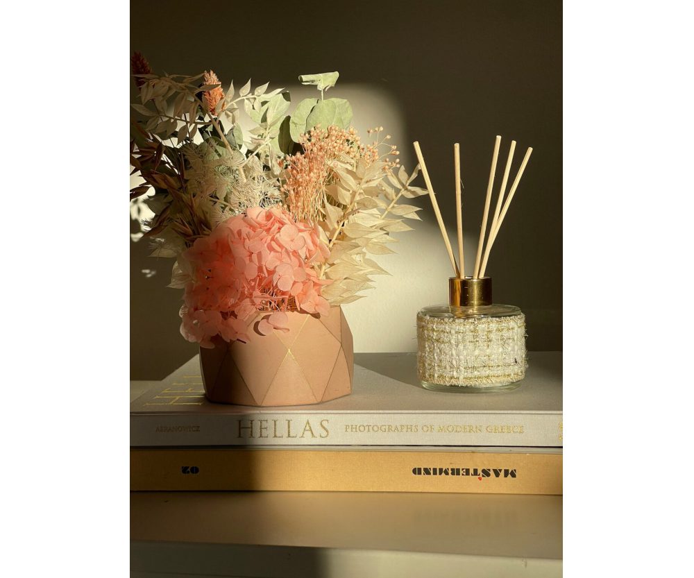 Dried flower arrangement in concrete vases